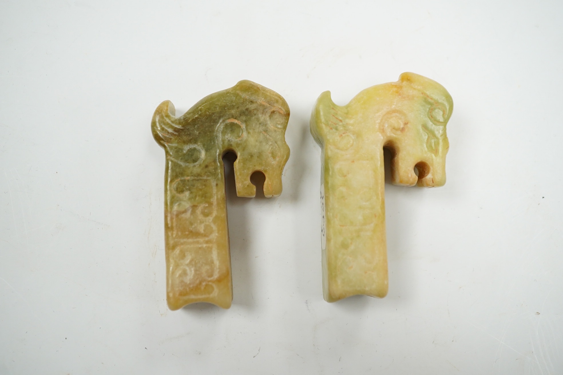 Two Chinese jade carvings in the form of animals, both 5cm high. Condition - good